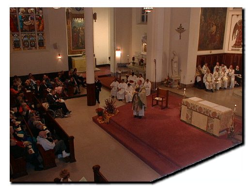 Picture of Cardinal O'Connor speaking to those gathered for the Mass Celebration