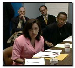 Community Board 11 member Juana Pacheco at a recent East Harlem Chamber of Commerce meeting. Juana is in Pink.