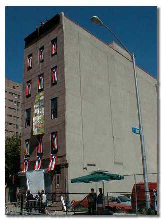 Tenement where Tito Puente grew up, the street sign to the right is where the unveiling took place.