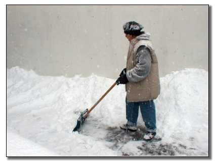 Picture of Home Owner begining to dig out from the storm
