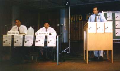 John Rivera moderating assembly candidates' debate 1996