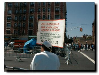 Another participant holding up a sign