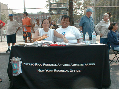 Picture of the Representatives of the Puerto Rico Federal Affairs Administration, who were on hand with helpful information.