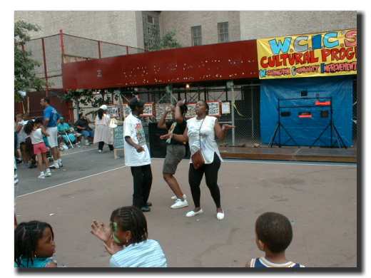 Picture of women dancing to the music